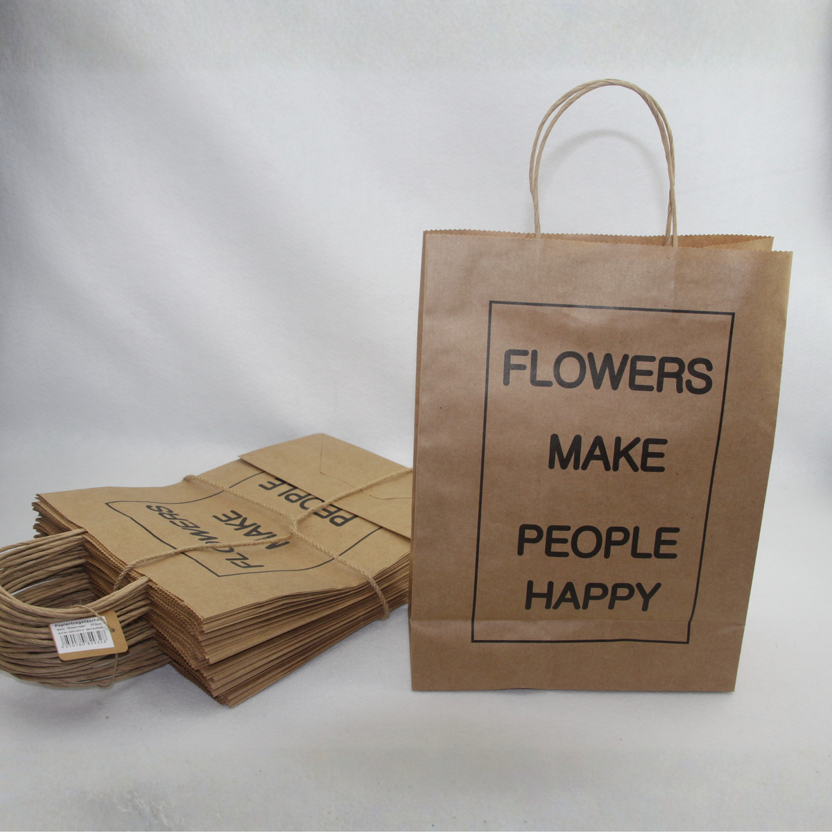Papiertragetaschen – Flowers make people happy